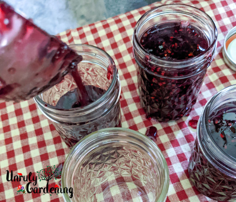 jars being filled with hot jam